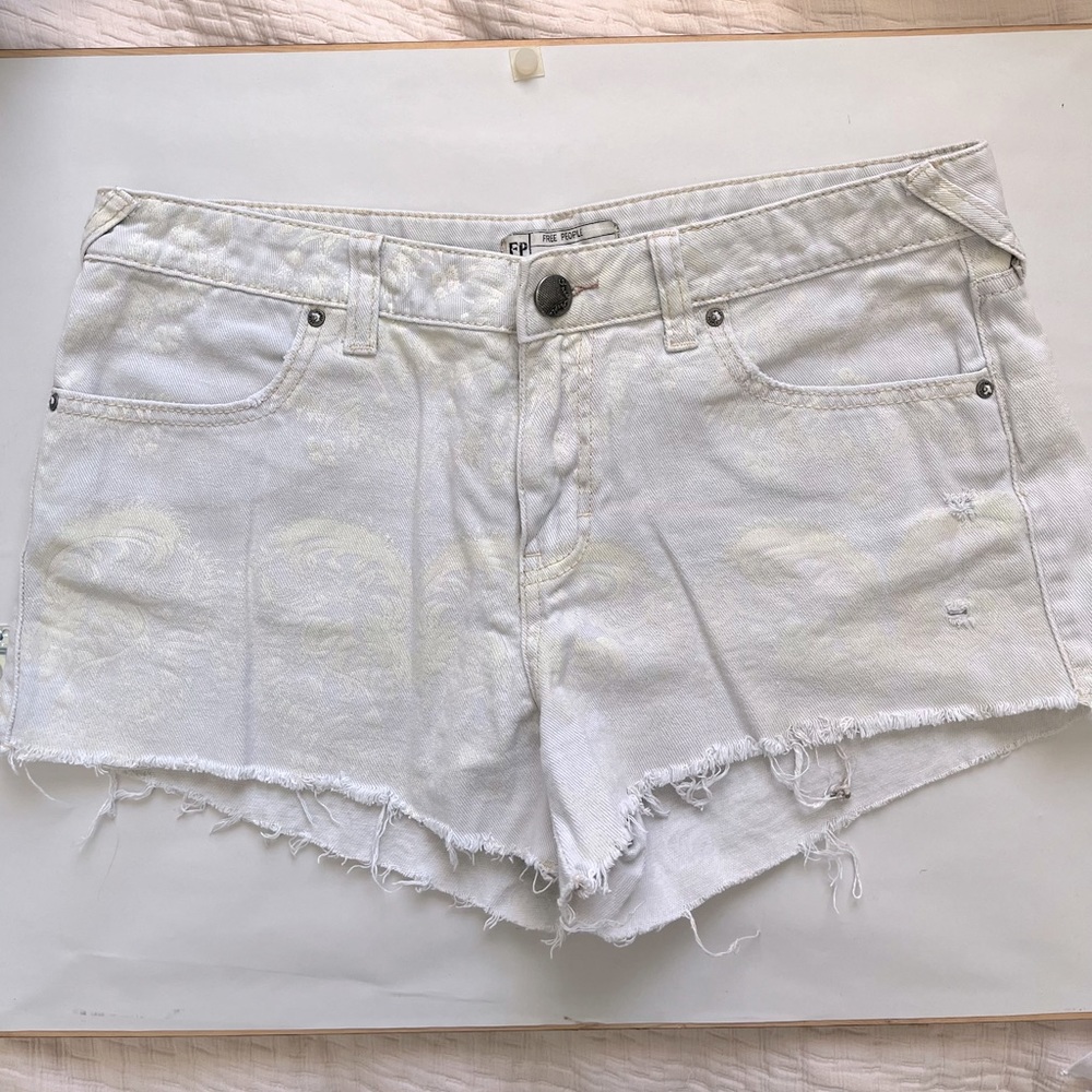 Free People Cutoff Denim Shorts in Light Gray with White Pattern